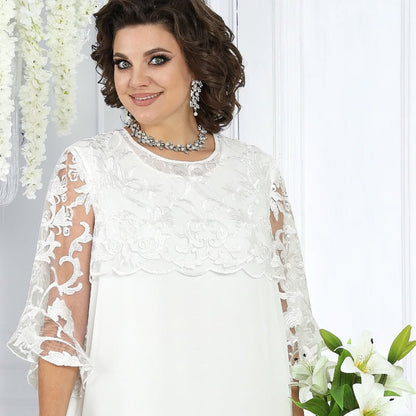 Women's dress with embroidered patchwork chiffon and a round neckline